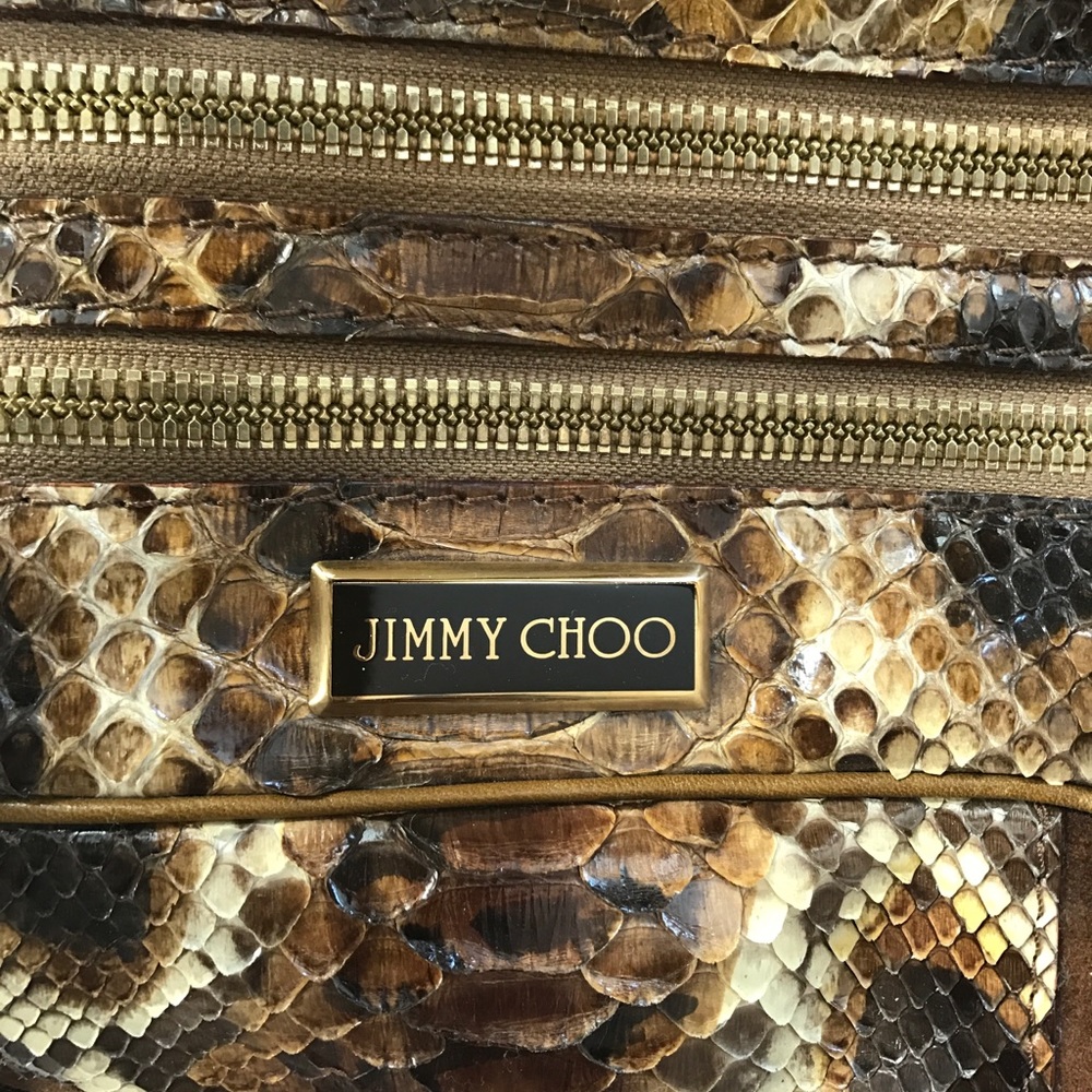 Rare PYTHON bag w/suede. Comes w/sleeper bag. No stains. No significant wear
